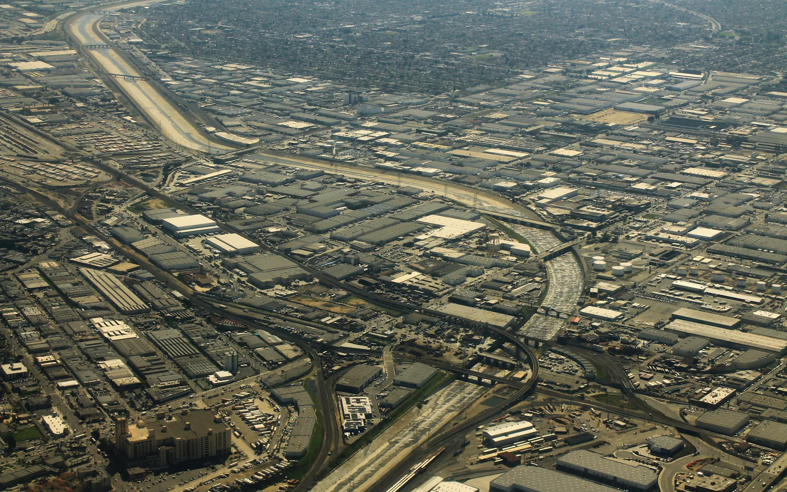 Aerial photograph of industrial warehouse area in Vernon, California, showing the working-class industrial character of Southeast Los Angeles County